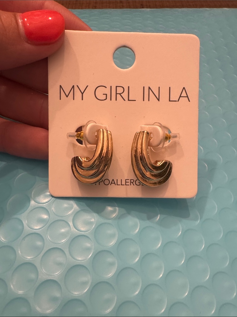 Gold Sculpted Wave Stud Earrings